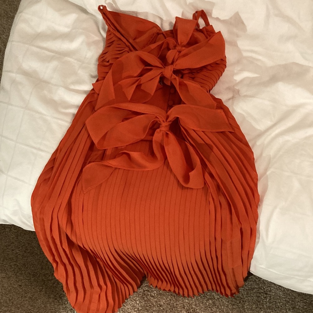 Les petites collection pleated orange dress